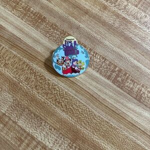 Disney light blue multicolor It's a Small World enamel pin 2004